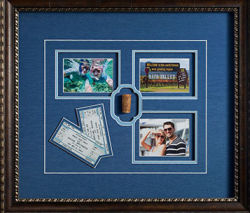 Family vacation themed framed piece showing event tickets, wine cork and family photos