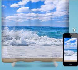 Phone photograph of beach with waves crashing shown as phone photo and shower curtain.